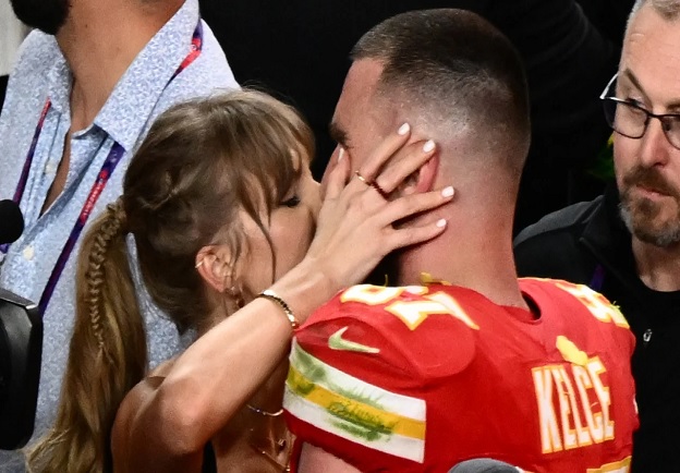 (Exclusive):Travis Kelce Says He's Learned From Taylor Swift's Music Taste: 'She's Amazing at What She Does'
